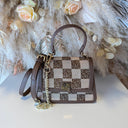 STEVE MADDEN BNIFTY-14 BAG 2602 - BRN/GLD