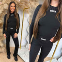 UNIQUE THE LABEL NENA LONGSLEEVE TOP BLACK/WHITE
